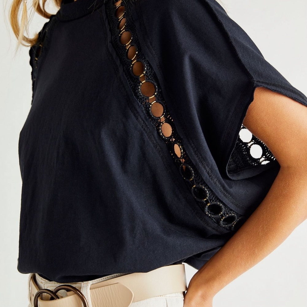 Free People Black rough around the edges top with metal ring cut outs